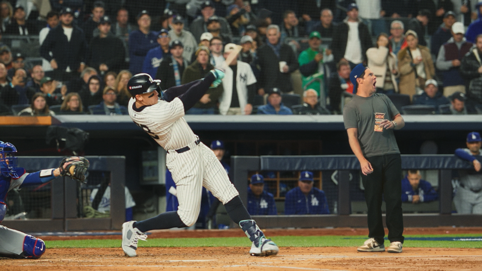 Actor Adam Devine watches Aaron Judge go deep