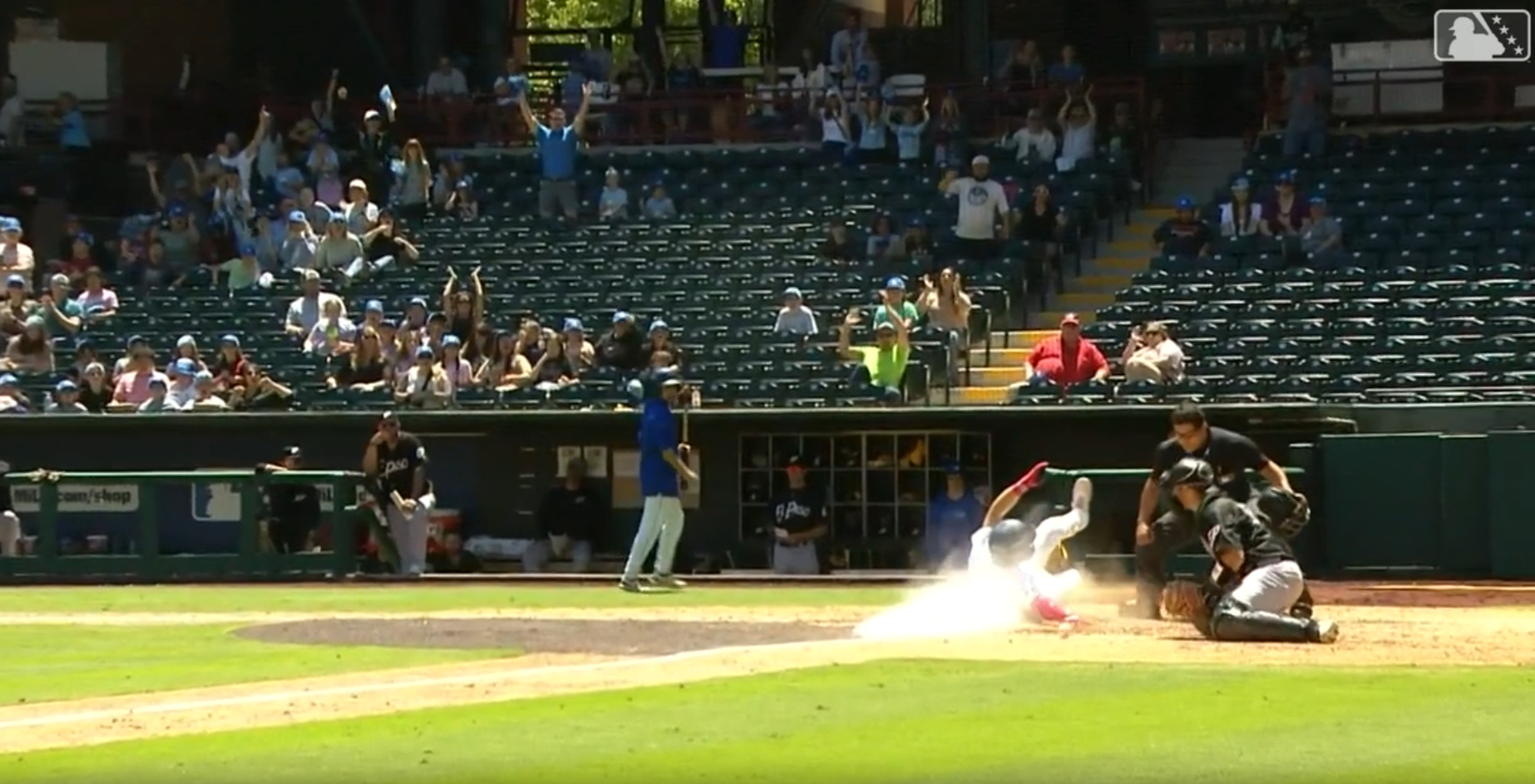 Ryan Ward slides home