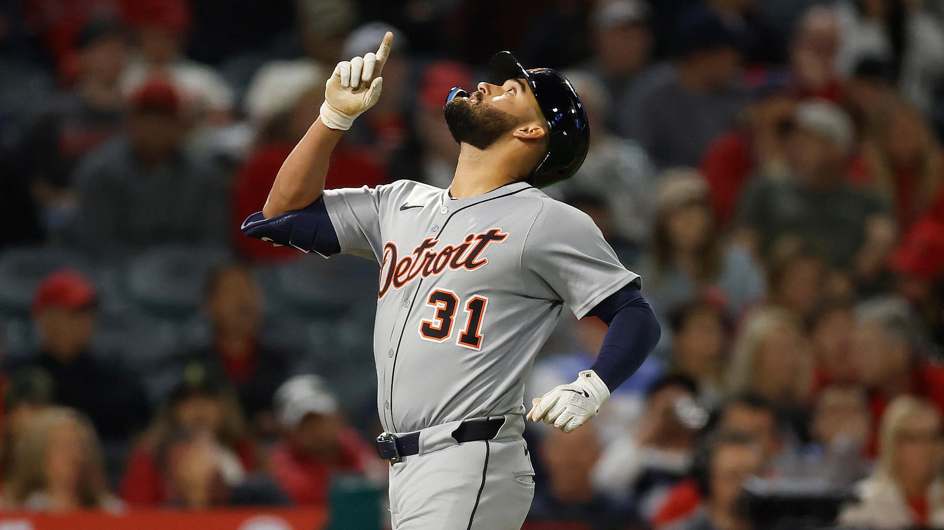 Detroit's Riley Greene points to the sky as he rounds the bases on a home run