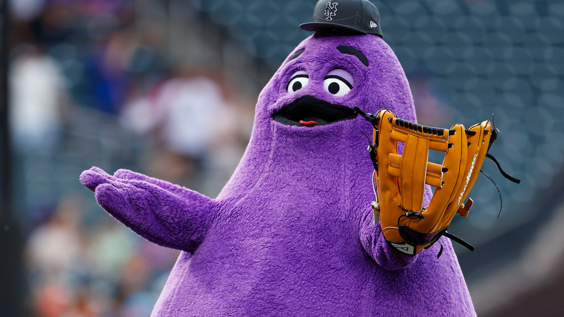 Grimace throwing out the first pitch