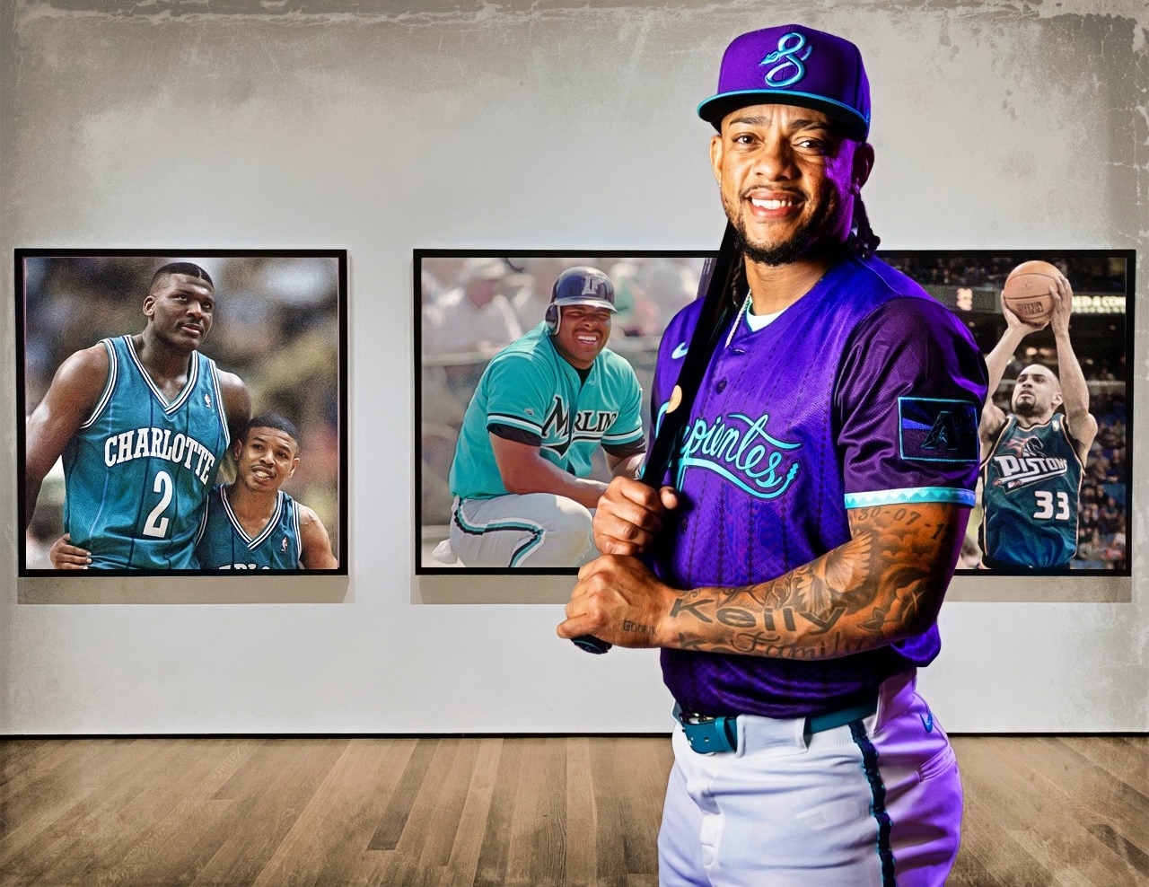 Ketel Marte models the D-backs' new City Connect uniforms in front of Larry Johnson of the Hornets, Bobby Bonilla of the Marlins and Grant Hill of the Pistons
