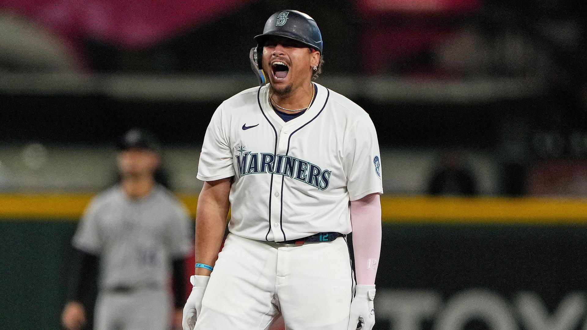 Josh Naylor celebrates his go-ahead bases-clearing double