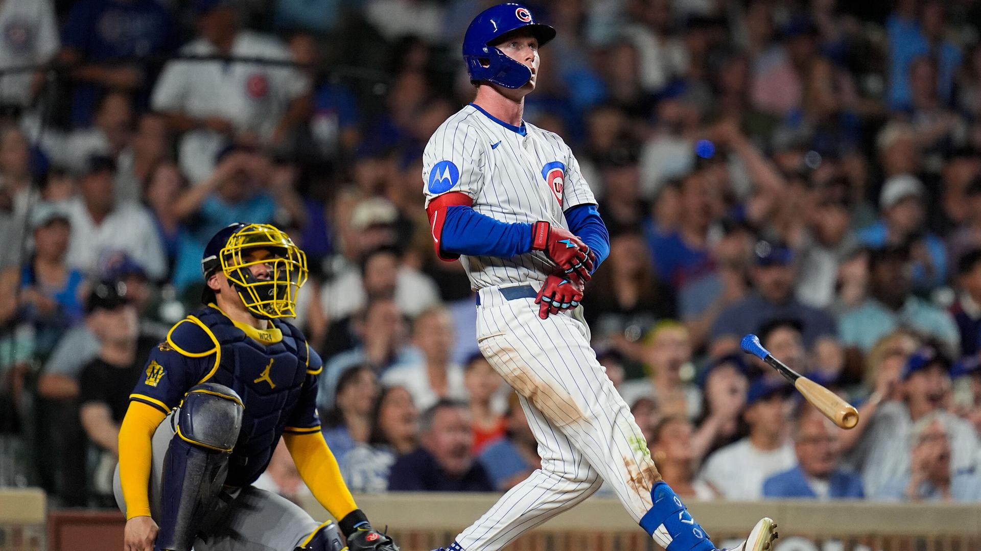 Pete Crow-Armstrong throws his bat after hitting a home run