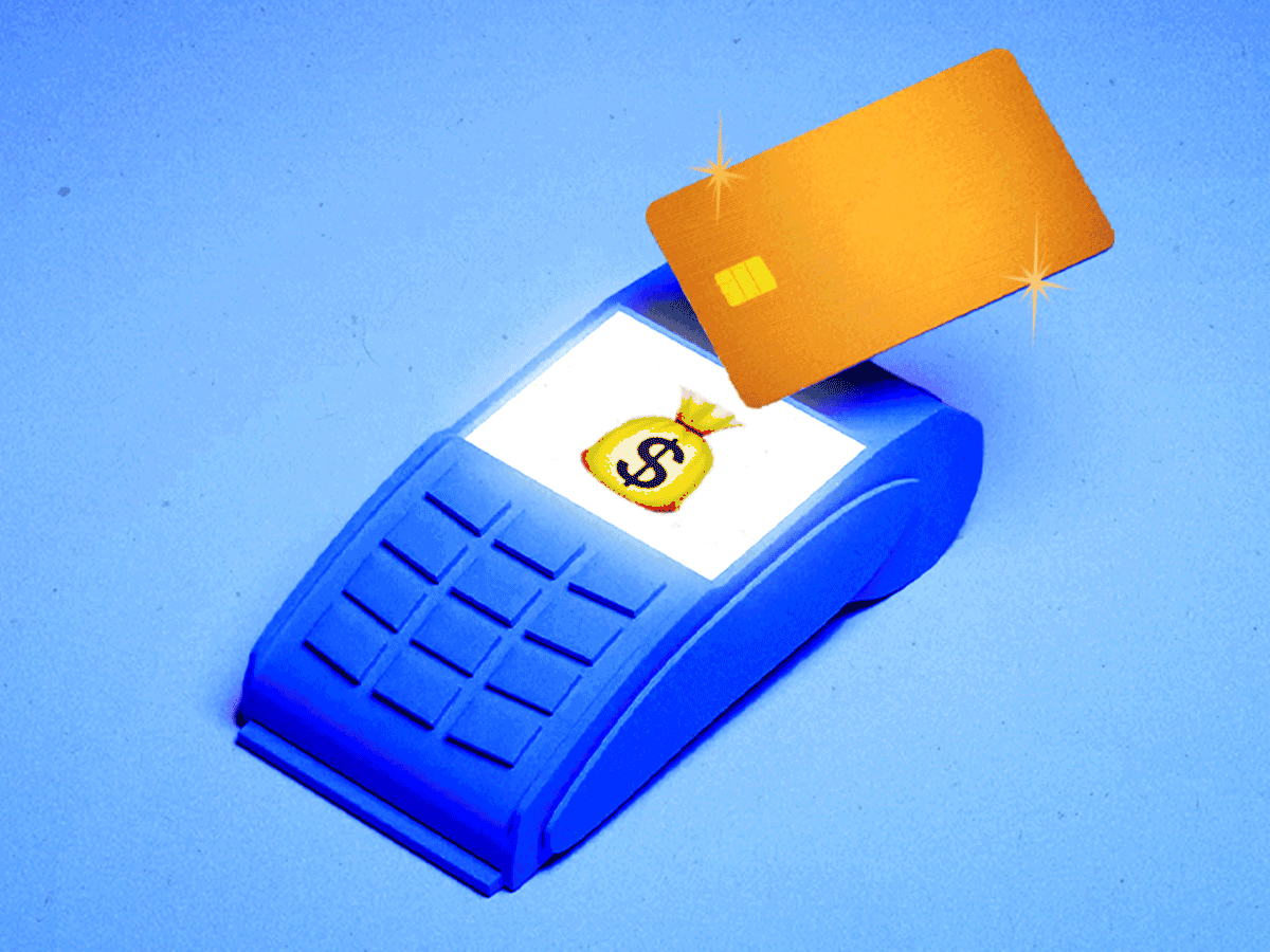 A gif of a credit card machine with emojis flashing on the screen.