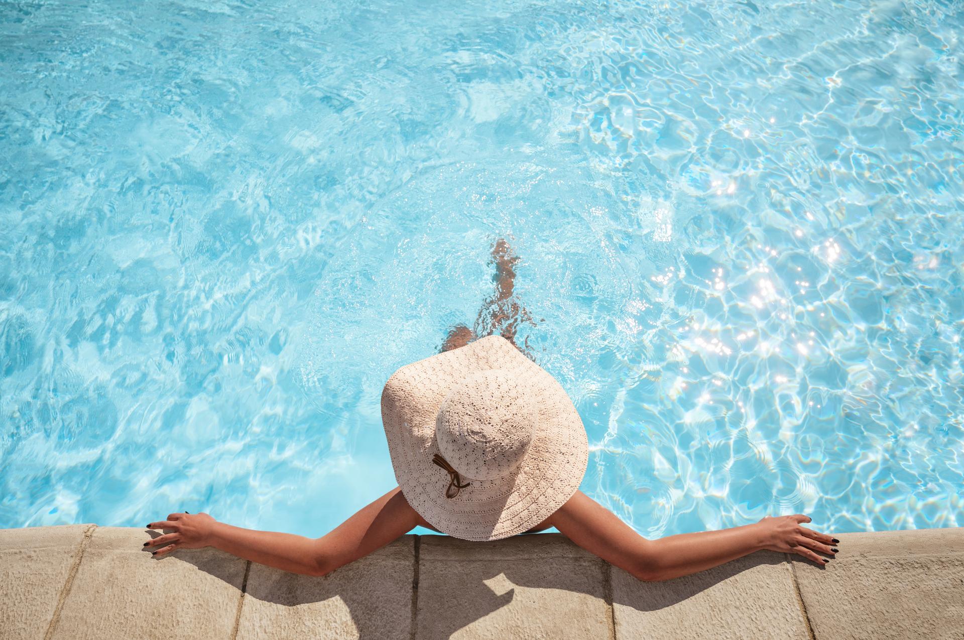 Image of woman relaxing in a pool