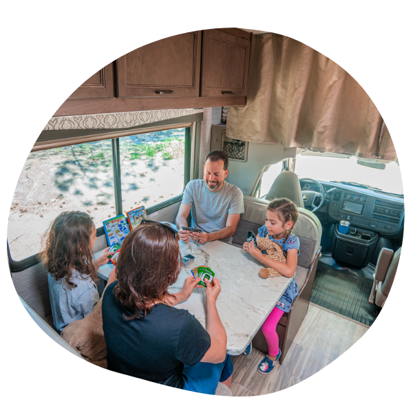 Family sitting in an RV