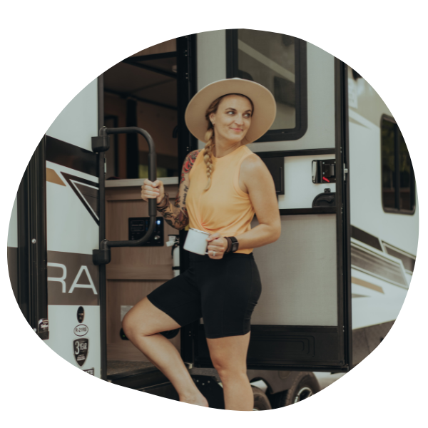 Woman standing outside of RV