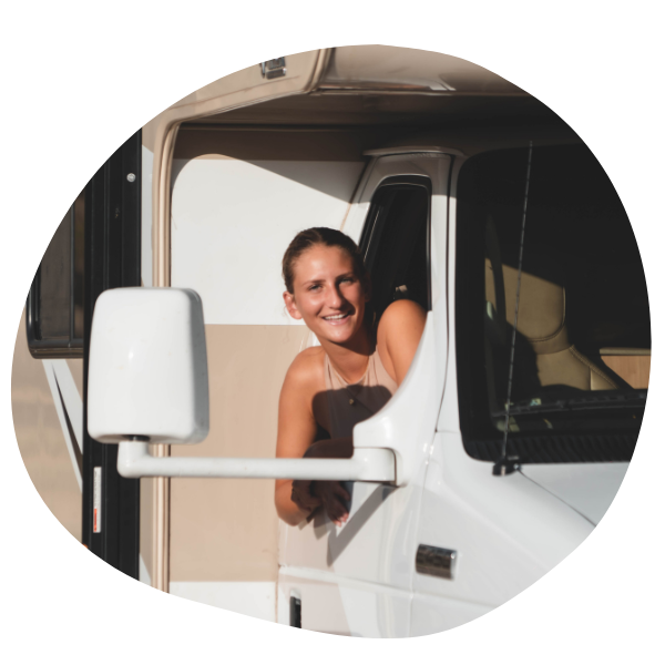 Person hanging out of RV