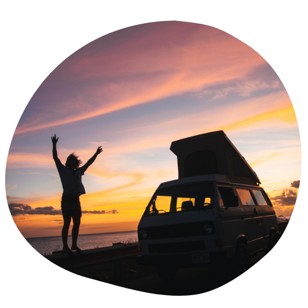 Person standing outside of campervan