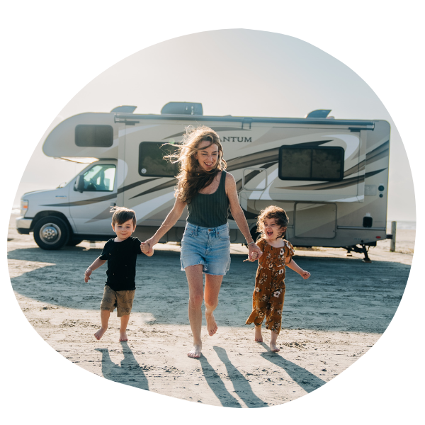 Mom with two kids in front of RV
