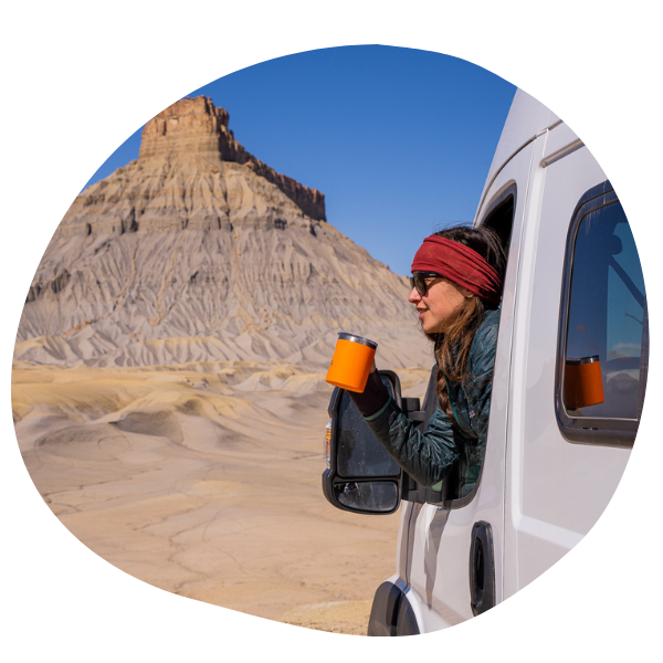 Person drinking outside of RV
