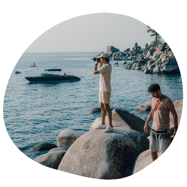 Two people looking over the water