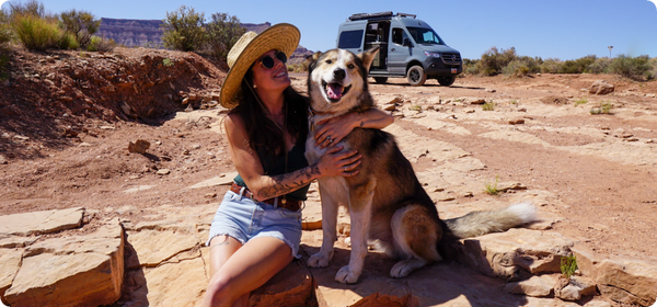Girl hugging dog