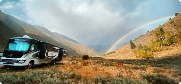 RV under a rainbow