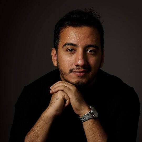 a person with glasses and a watch