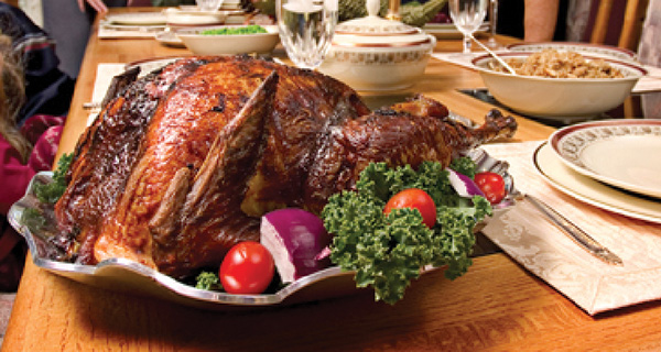 Thanksgiving dinner on dining table.