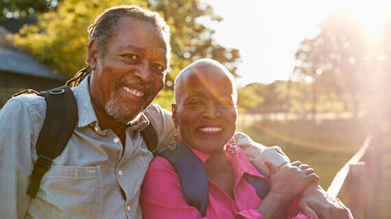 Senior couple out on a hike.
