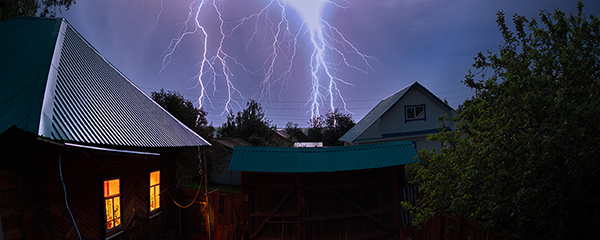 Lightning during a thunderstorm near neighborhood