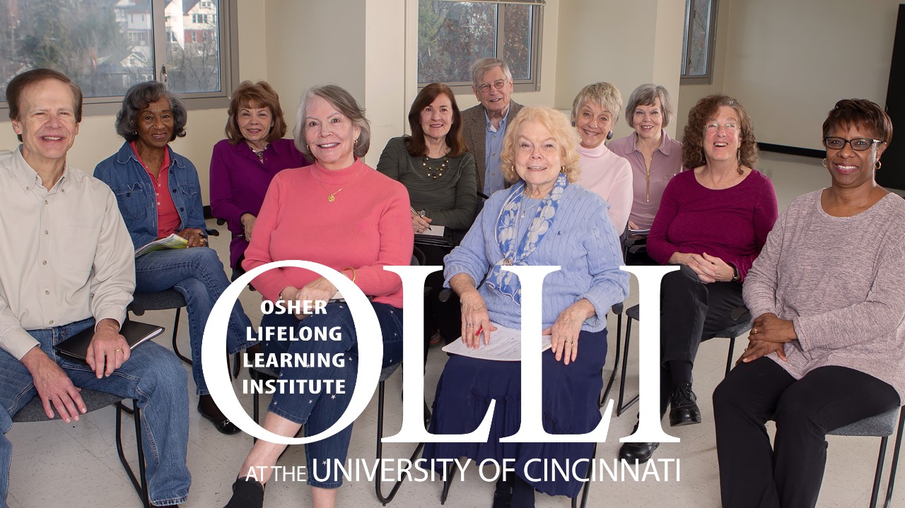 Group of people in a classroom with OLLI logo