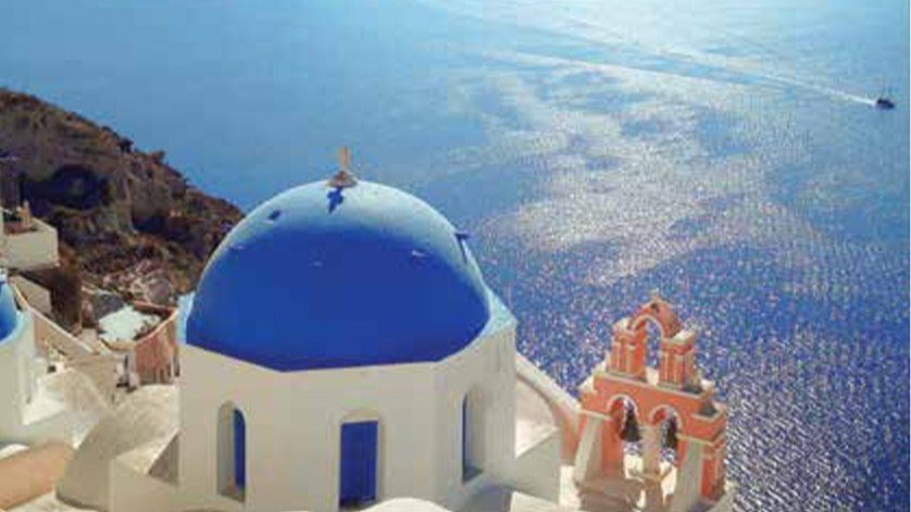 blue and white building overlooking the Mediterranean Sea