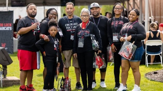 Family enjoying a pre-game event