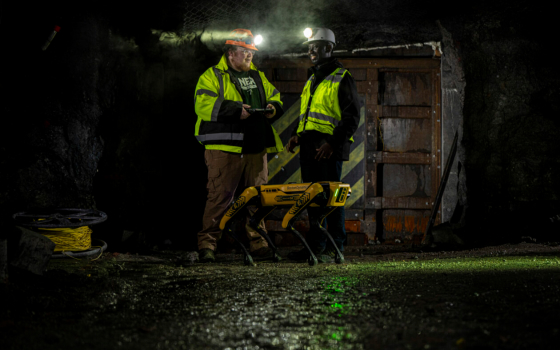 Dustin Peterson, left, recently assisted Dr. Kwame Awuah-Offei with research related to using a Boston Dynamics Spot robot for mine emergencies. Peterson and Awuah-Offei are shown here working with the robot in S&T’s Experimental Mine. Photo by Michael Pierce/Missouri S&T.