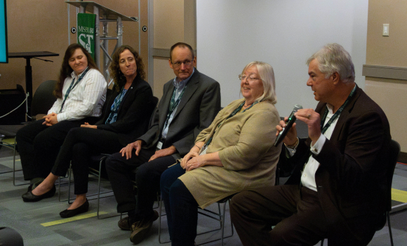 Thomas Sonderman, far right, was part of a panel discussion at the third annual Resilient Supply of Critical Minerals national workshop. Sonderman is an alumnus of Missouri S&T and CEO of SkyWater Technology. He is pictured here, from left, with Dr. Dawn Wellman, of Rio Tinto; Amber Steele, of the Missouri Geological Survey; Dr. Jeffrey Mauk, of the U.S. Geological Survey; and Dr. Michelle Michot Foss, of Rice University’s Baker Institute. Photo by Greg Edwards/Missouri S&T. 