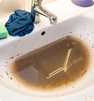 Slow draining water in sink