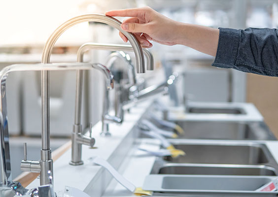 viewing sinks in kitchen showroom