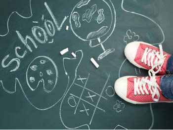 Summer sneakers and a school chalk drawing