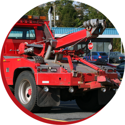 Tow Truck diving down the road