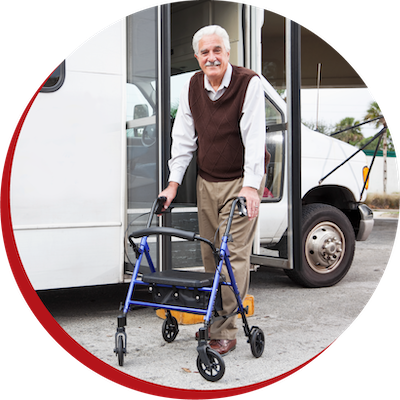 Old man stepping out of bus with walker
