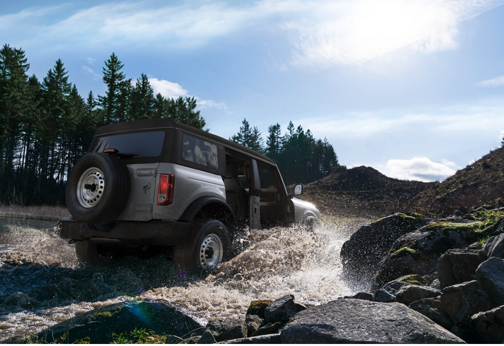 Ford Bronco Driving Through Wet Terrain 