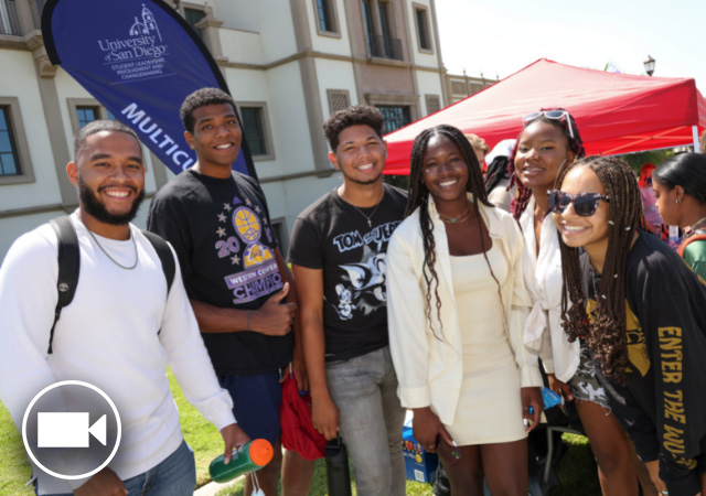Image of students standing in Paseo De Colachis for Alcalá Bazaar