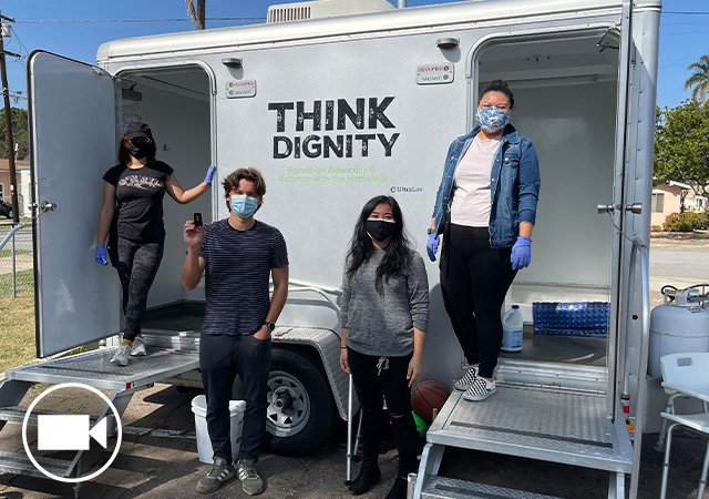 Image of the Think Dignity team in front of the Fresh Start Mobile Showers