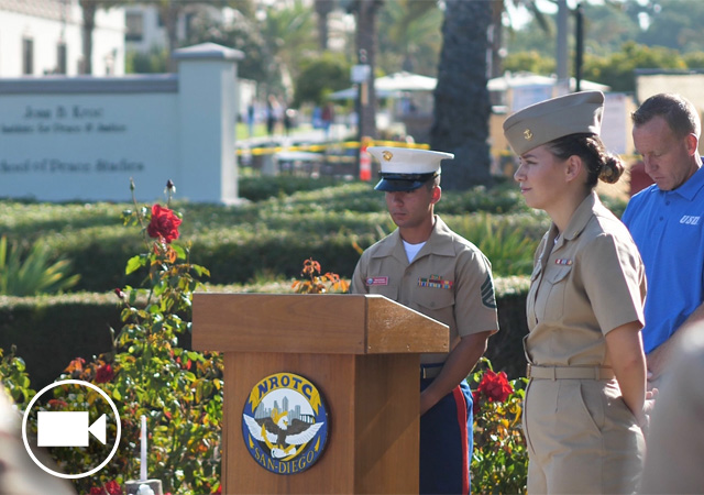 NROTC student standing at attention during the 9/11 remembrance ceremony in the Garden of the Sky