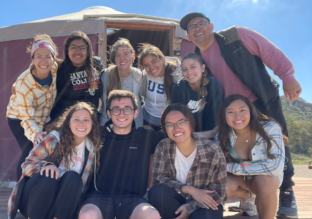 Students visit the U.S.-Mexico border during a Spring Break immersion trip