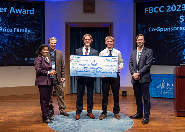 Junior Job Hunt founders pose with award check