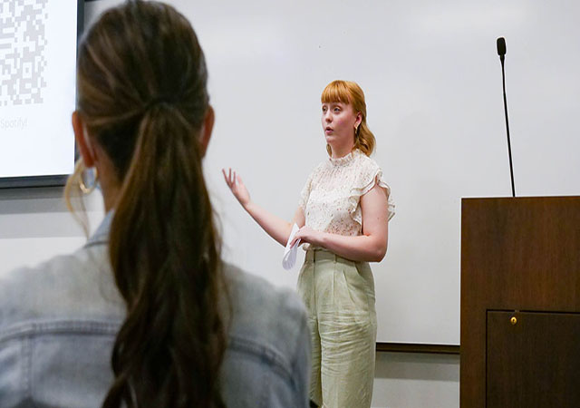 Image of a student presenting at Honors Colloquium 
