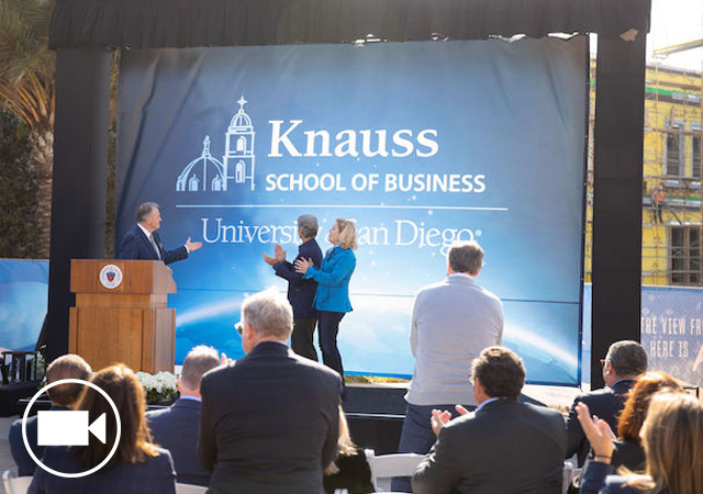 Image of USD Board Chairman Don Knauss, and his wife, Ellie, and President Harris announcing business school name