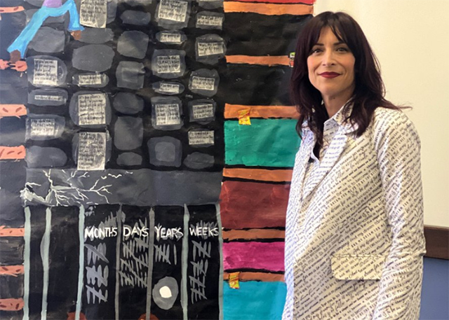 Zulema Reynoso posed next to her research
