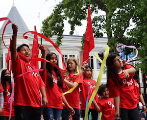 Youth playing with ribbons