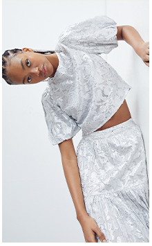 sparkle puff sleeve tie back top
