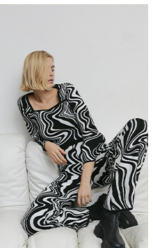 warped jacquard knit flared trousers