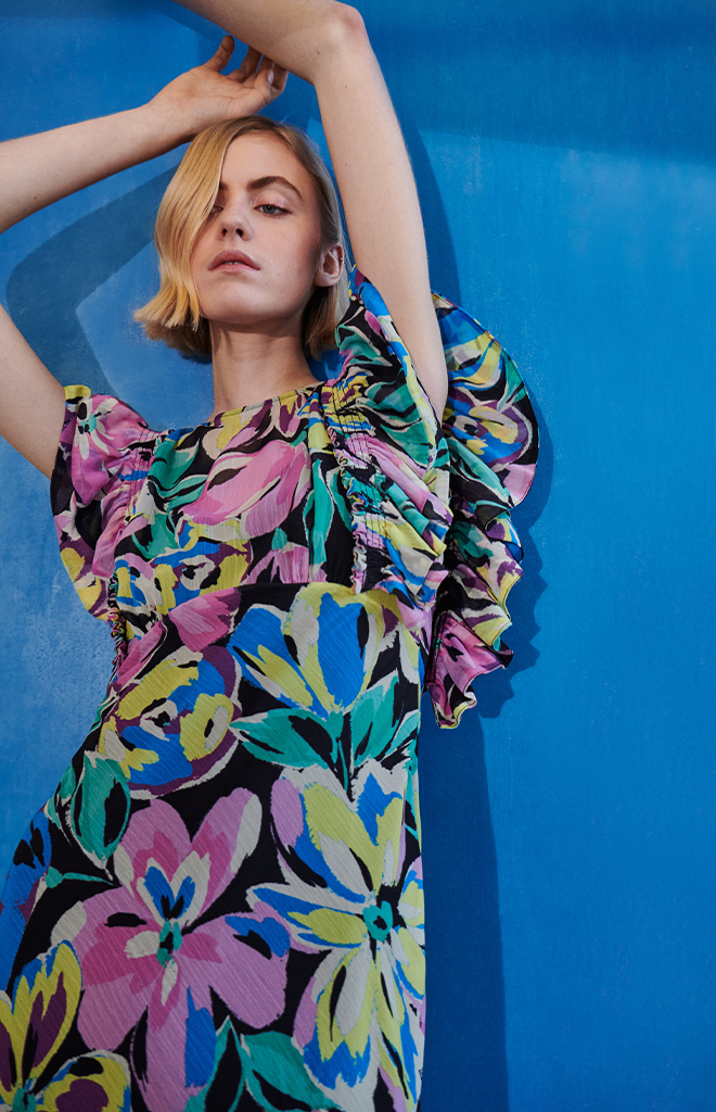 In Bloom | Shop Now >>