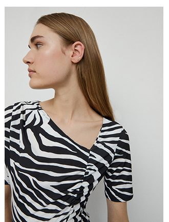 asymmetric neckline recycled zebraprint top