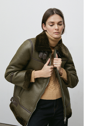 zip front faux leather bonded fur biker