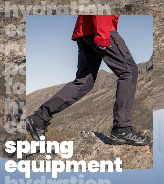 Person on a hike, wearing walking trousers and walking shoes