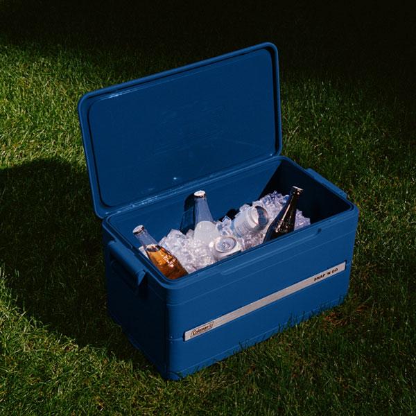 A cooler filled with ice and cold drinks.