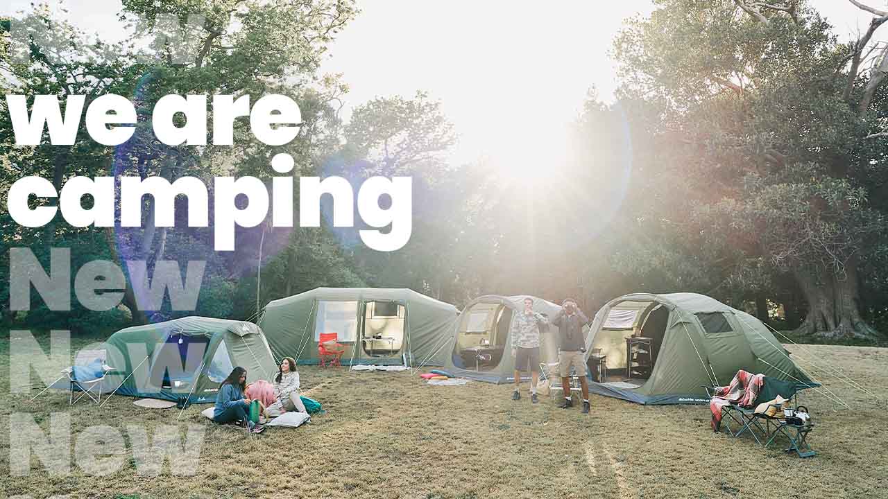 A collection of tents in a field